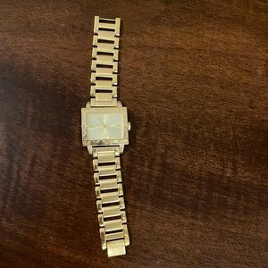 Gold tone authentic Coach watch.